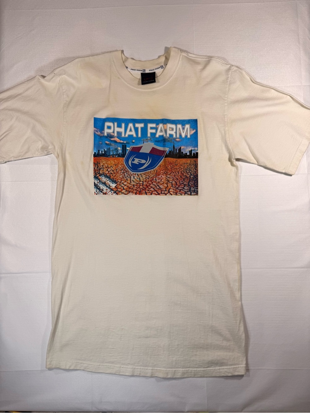 Phat Farm Cream Tee with Blue and Orange Graphic